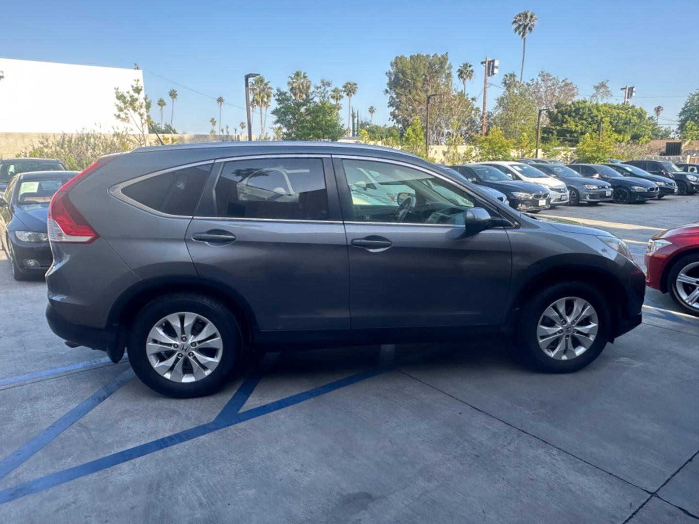 2012 Grey /Gray Honda CR-V EX-L 2WD 5-Speed AT (JHLRM3H78CC) with an 2.4L L4 DOHC 16V engine, 5-Speed Automatic transmission, located at 30 S. Berkeley Avenue, Pasadena, CA, 91107, (626) 248-7567, 34.145447, -118.109398 - Moon-roof! Leather seats! This 2012 Honda CR-V EX-L 2WD 5-Speed AT looks and drives good. - Photo#5